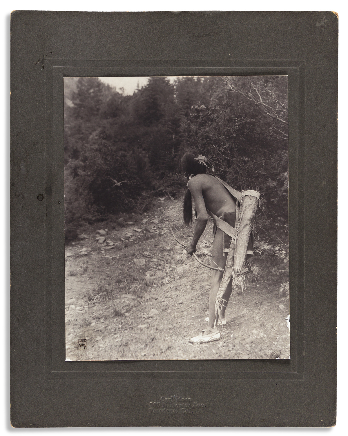(AMERICAN INDIANS--PHOTOGRAPHS.) Carl Moon. Untitled portrait of an Indian bird hunter.